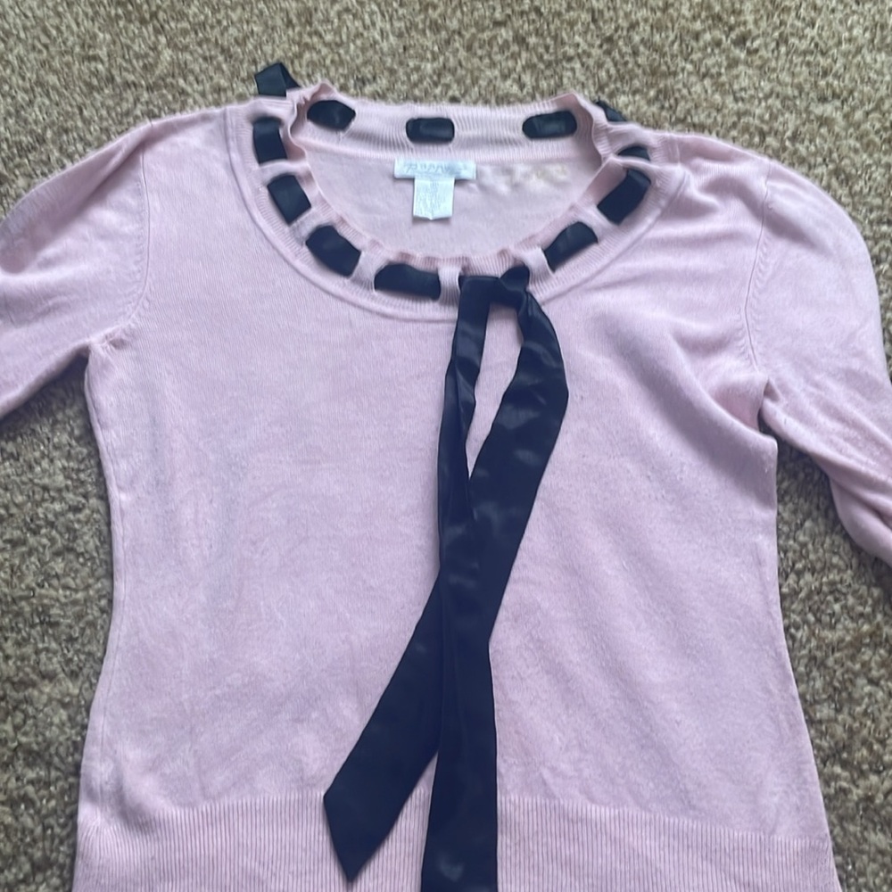 Pink sweater with black tie along neckline - Picture 11 of 11